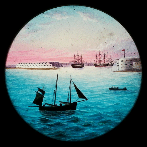 An animated magic lantern slide depicting boats at harbour, 