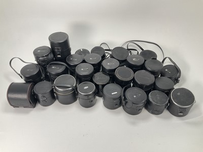 Lot 883 - A Large Selection of Rigid Lens Cases