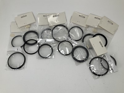 Lot 913 - A Selection of Stepping Rings Over 58mm