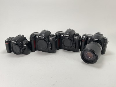 Lot 447 - Four Nikon Digital SLR Cameras