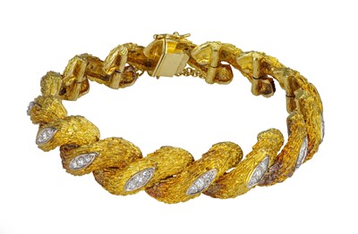 Lot 13 - An 18 carat yellow gold and diamond bracelet