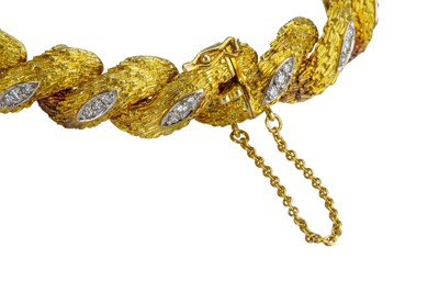 Lot 13 - An 18 carat yellow gold and diamond bracelet