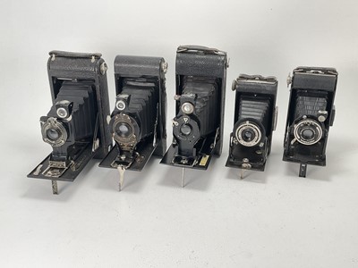 Lot 635 - A Selection of Five Folding Cameras