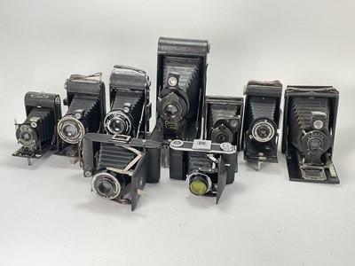 Lot 648 - A Selection of 9 Folding Cameras