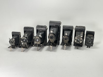 Lot 633 - A Selection of Seven folding Cameras