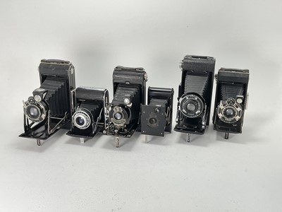 Lot 631 - A Selection of Six Folding Cameras