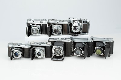 Lot 751 - A Selection of Eight Folding Cameras