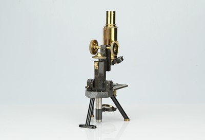 Lot 234 - A Brass Microscope By Swift & Sons
