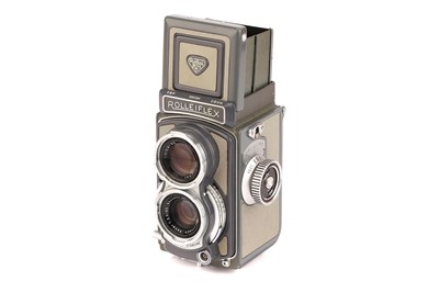 Lot 1195 - A Rollei Rolleiflex 4x4 Baby Grey TLR Camera