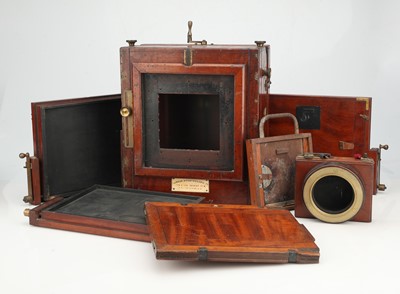 Lot 685 - A Mahogany & Brass London Stereoscopic Co. Tailboard Camera