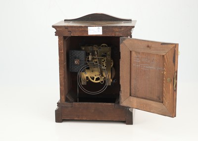 Lot 629 - A Victorian Walnut and Stained Beech Mantle Clock