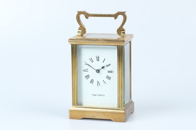 Lot 625 - A 20th Century Lacquered Brass Carriage Clock