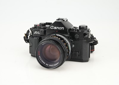 Lot 115 - A Canon A-1 35mm SLR Outfit