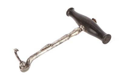 Lot 71 - A Tooth Key with Reversing Latch