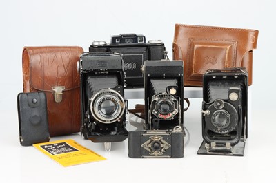 Lot 371 - A Selection of Five Folding Cameras