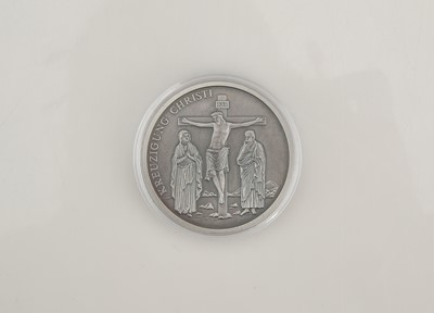 Lot 56 - A boxed set of silver plated coins commemorating the History of Christianity