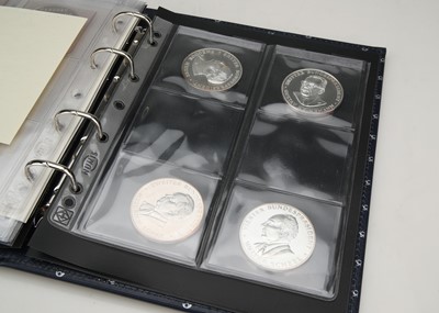 Lot 41 - A folder of 999.9 pure silver 50 g medallions