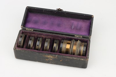 Lot 584 - A Brass Convertible Lens Set