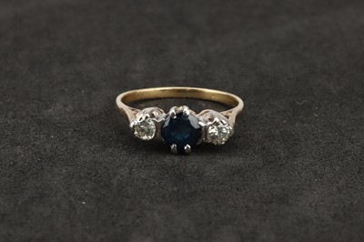 Lot 128 - Diamond and Sapphire Three Stone Dress Ring