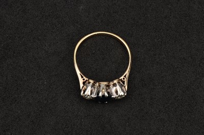 Lot 128 - Diamond and Sapphire Three Stone Dress Ring