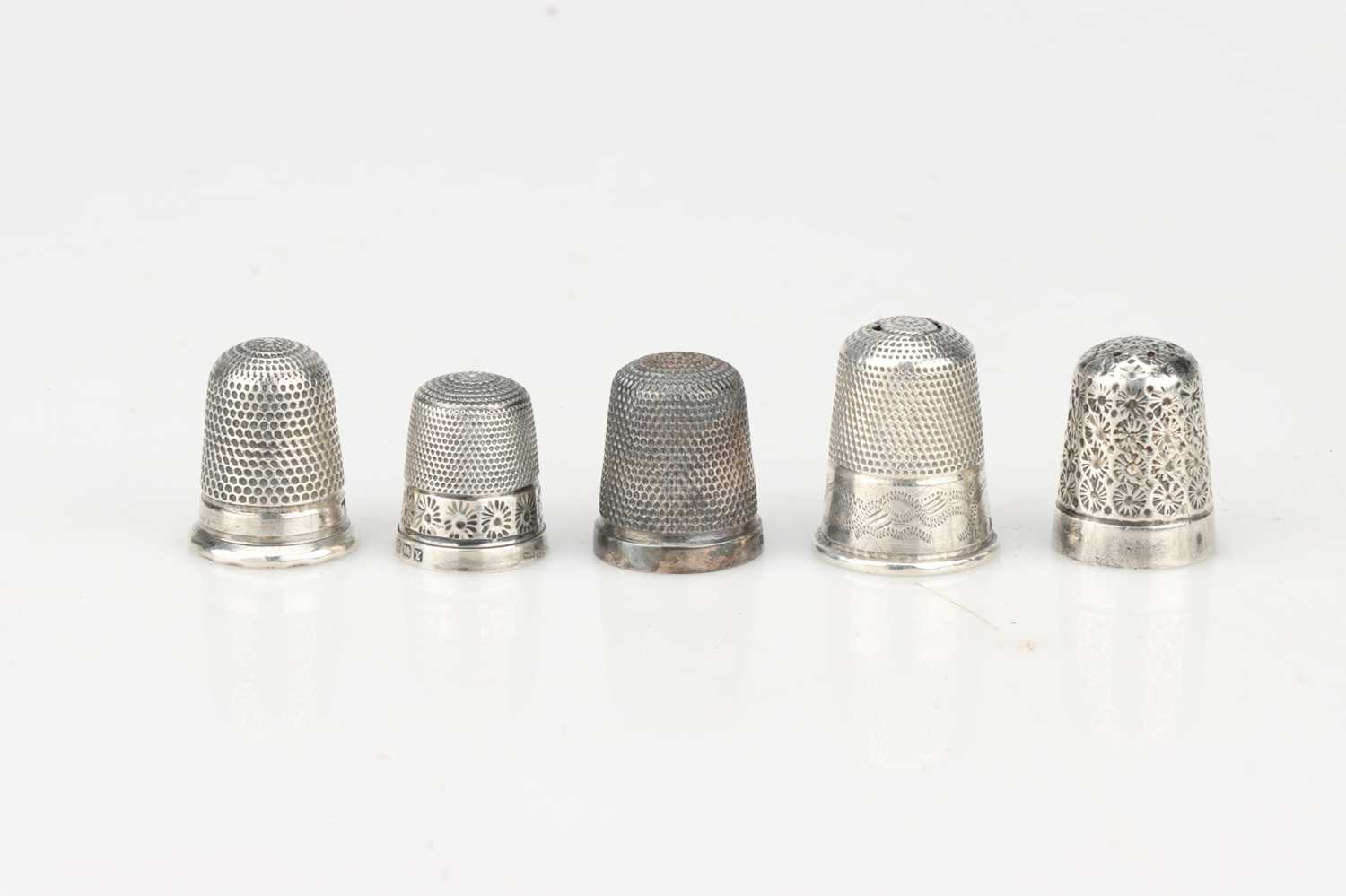 Lot 62 - A Group of Five Silver Thimbles