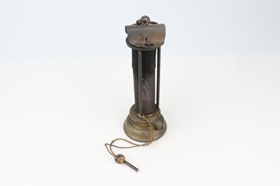 Lot 223 - An Early Miners Davey Lamp