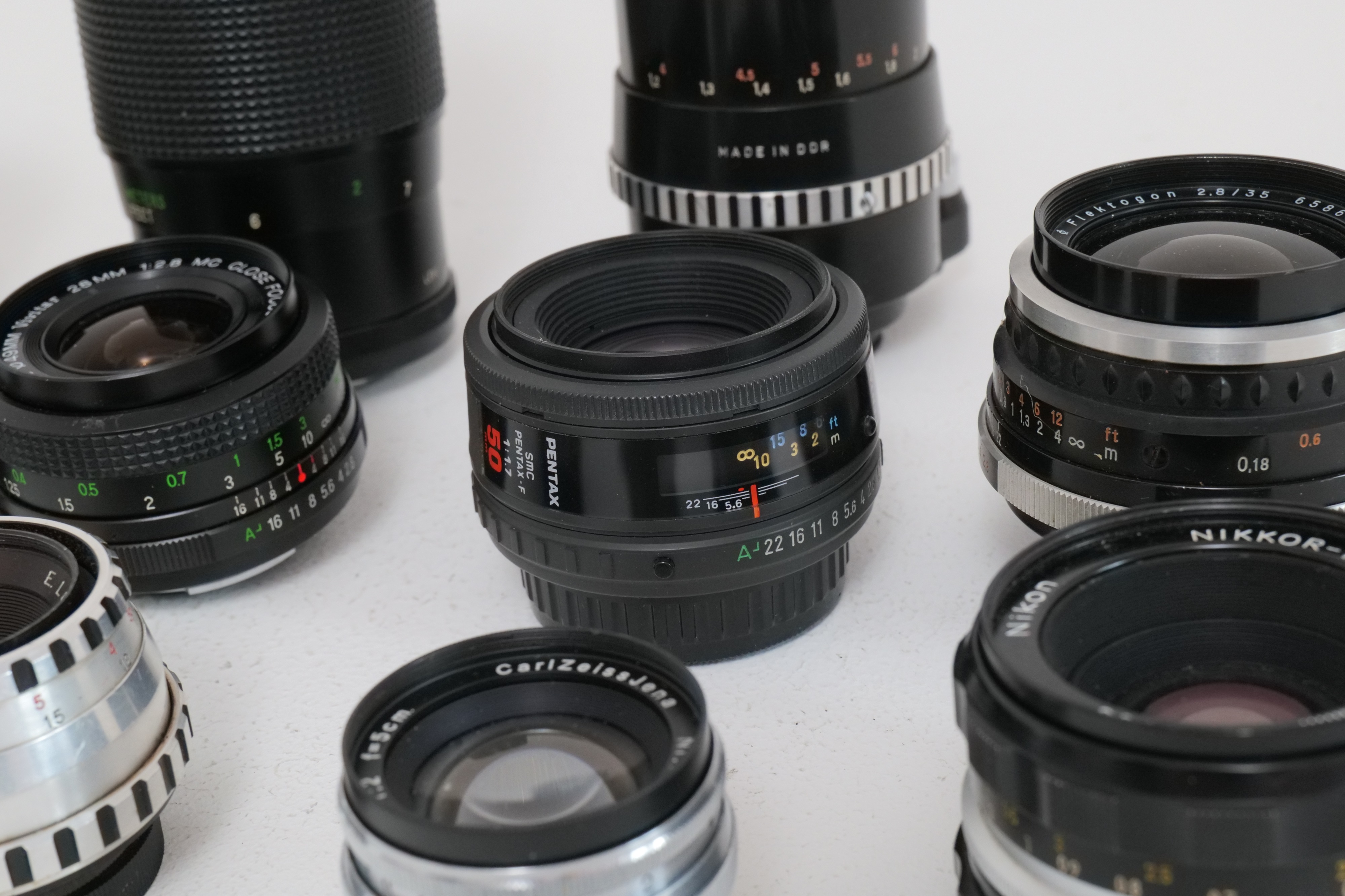 Camera Lenses Examples Lot 597 - A Selection of Various Camera Lenses,