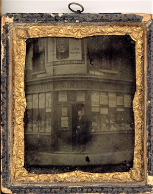 Lot 189 - Three Early Photographs of Shop Fronts