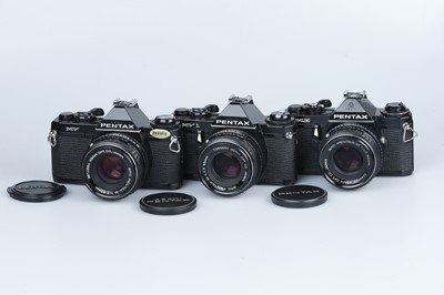 Lot 662 - Three Black Pentax M Series 35mm SLR Cameras