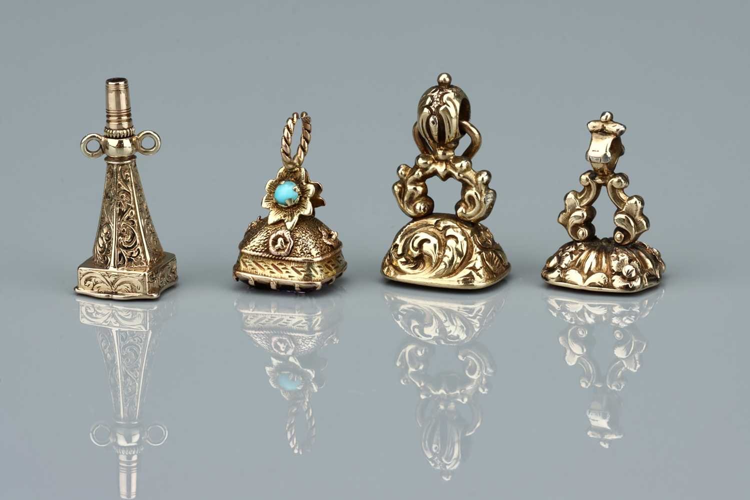 Lot 136 - A Collection of Four Victorian Fob Seals and Charms