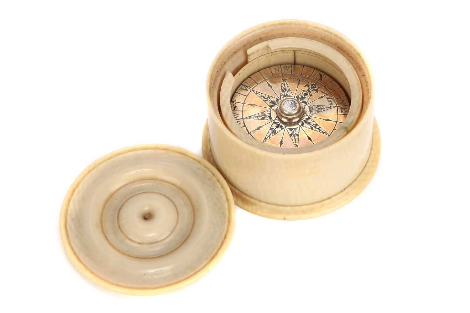 Floatable Compass Lot 145 - An Unusual Silver & Ivory Floating Compass