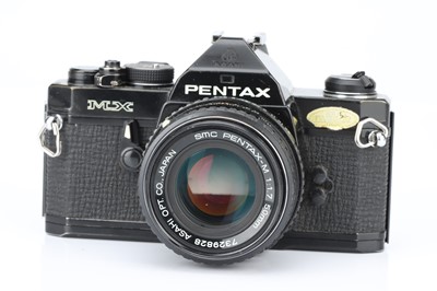 Lot 658 - A Penax MX SLR Camera