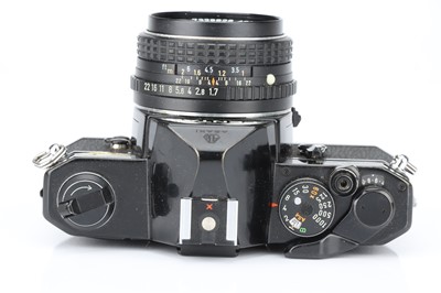 Lot 658 - A Penax MX SLR Camera