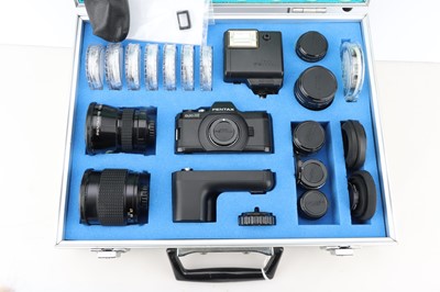 Lot 742 - A Complete Pentax Auto 110 Camera Outfit