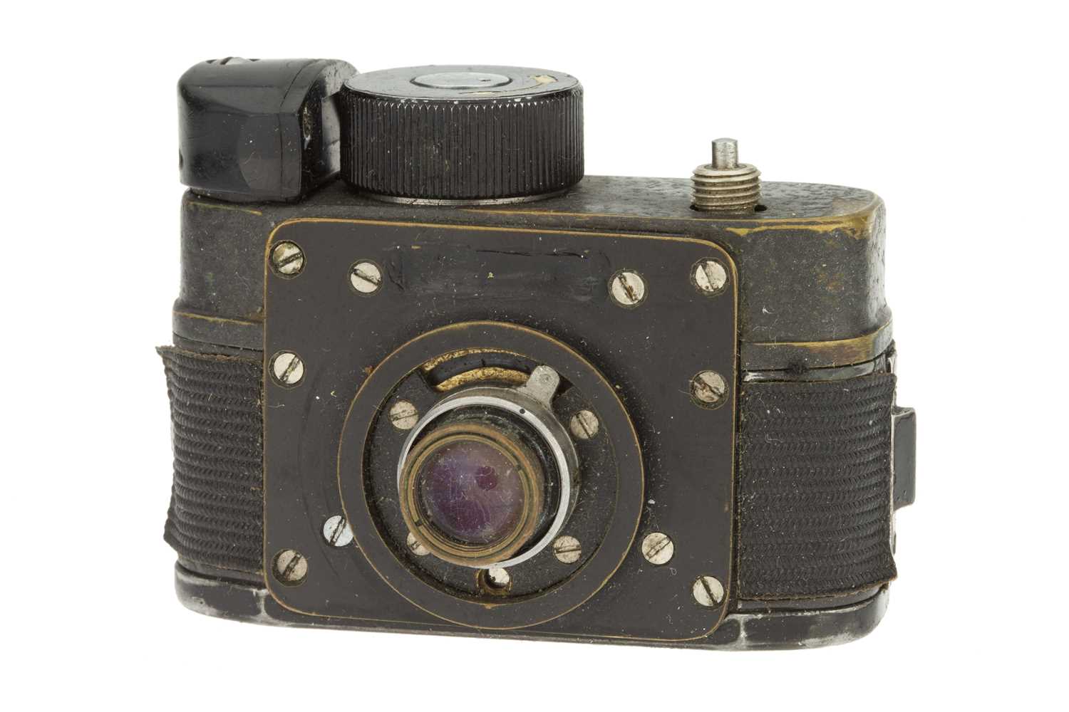 Lot 138 A Krasnogorski F21 Buttonhole Camera,