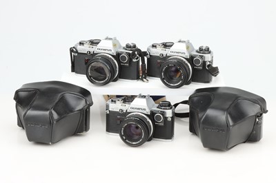 Lot 633 - Three Olympus OM-10 SLR Cameras