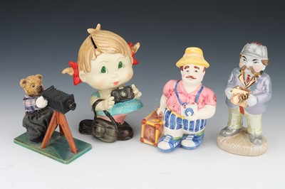 Lot 447 - Four Camera / Photographic Related Ceramic Figures