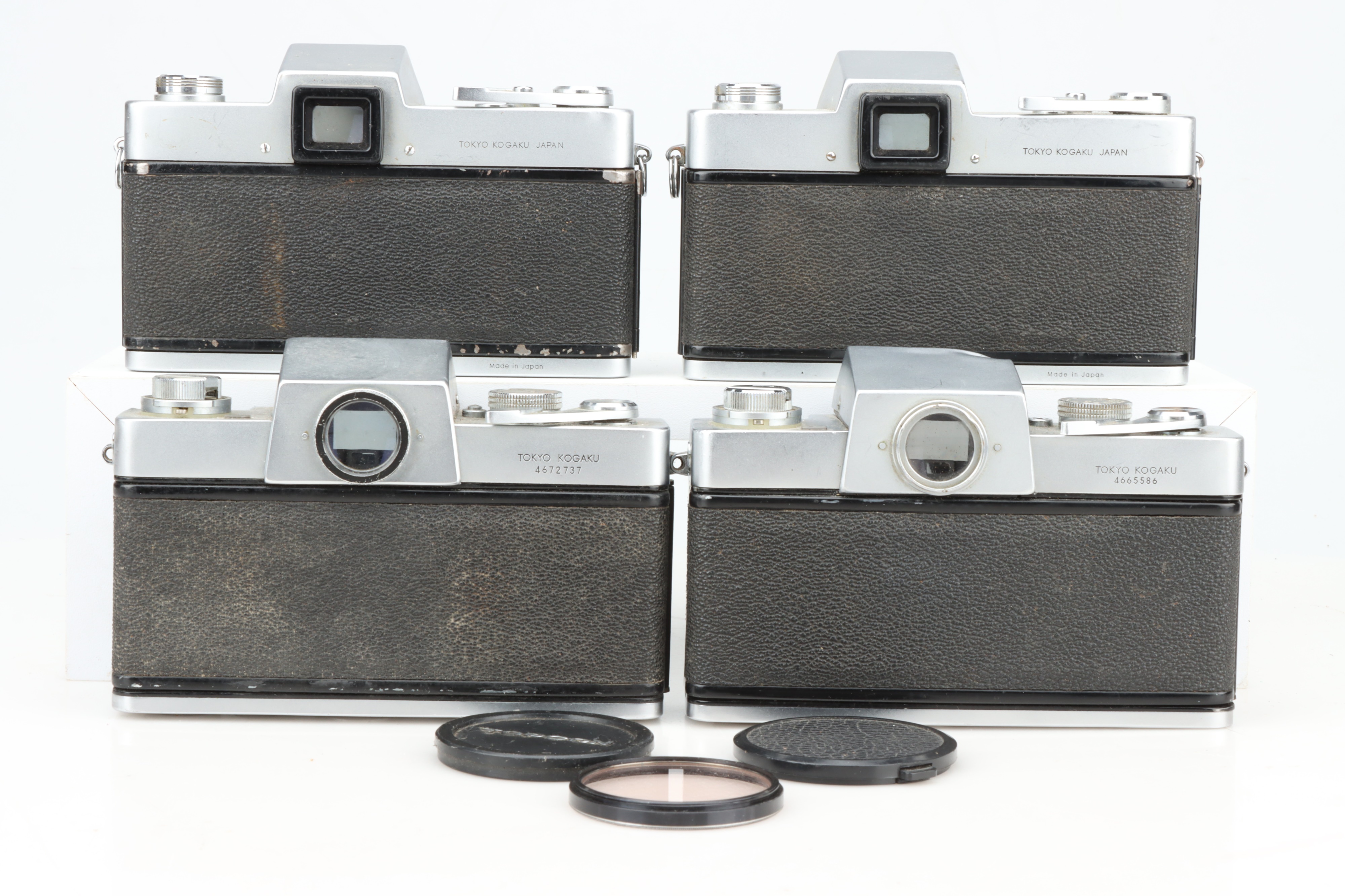 Lot 410 - Four Topcon SLR Cameras,