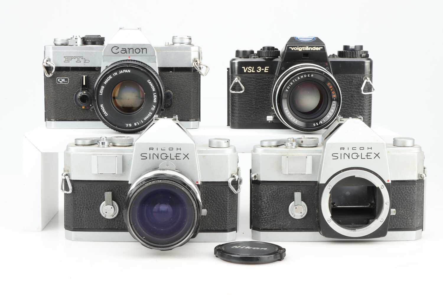 Lot 413 - Three SLR Cameras,