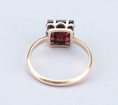 Lot 141 - A Pincess Cut Ruby Solitaire Ring