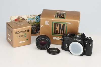 Lot 628 - A Nikon EM 35mm SLR Camera