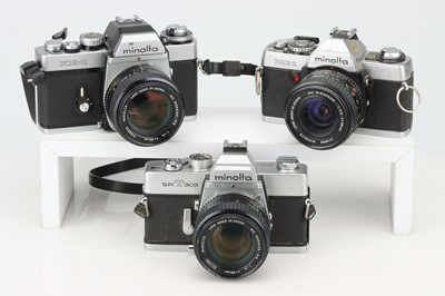 Lot 427 - Three Minolta SLR Cameras