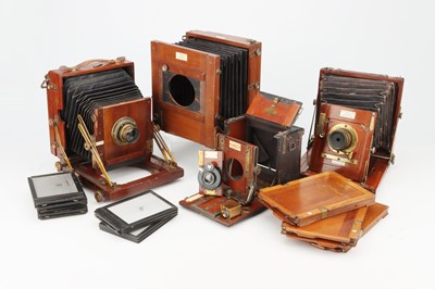 Lot 595 - A Selectino of Mahogany & Brass Half Plate Cameras