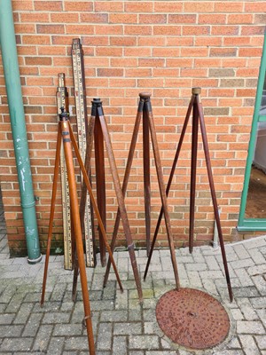 Lot 314 - A Collection of Surveyors Tripods and Staffs