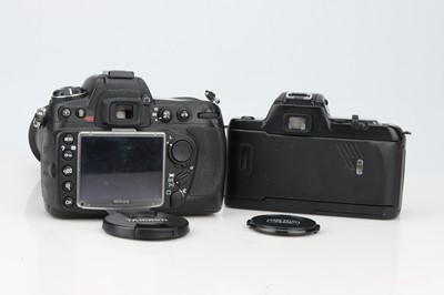 Lot 629 - Two Nikon SLR Cameras
