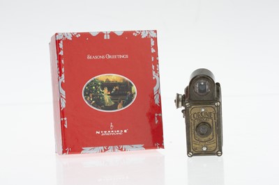 Lot 380 - A Coronet Midget Green Sub Miniature Camera