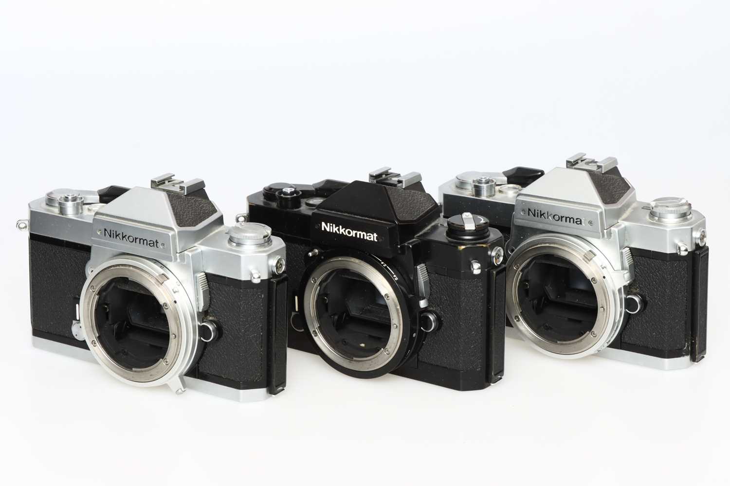 Lot 312 - Three Nikon Nikkormat SLR Camera Bodies