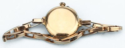 Lot 166 - A 15 ct Gold Trench Watch