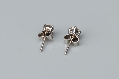 Lot 158 - A Pair of 14 ct White Gold Solitaire Stud Earrings