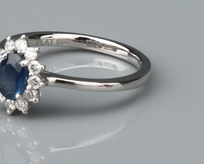 Lot 161 - A Sapphire and Diamond Platinum Star Cluster Ring